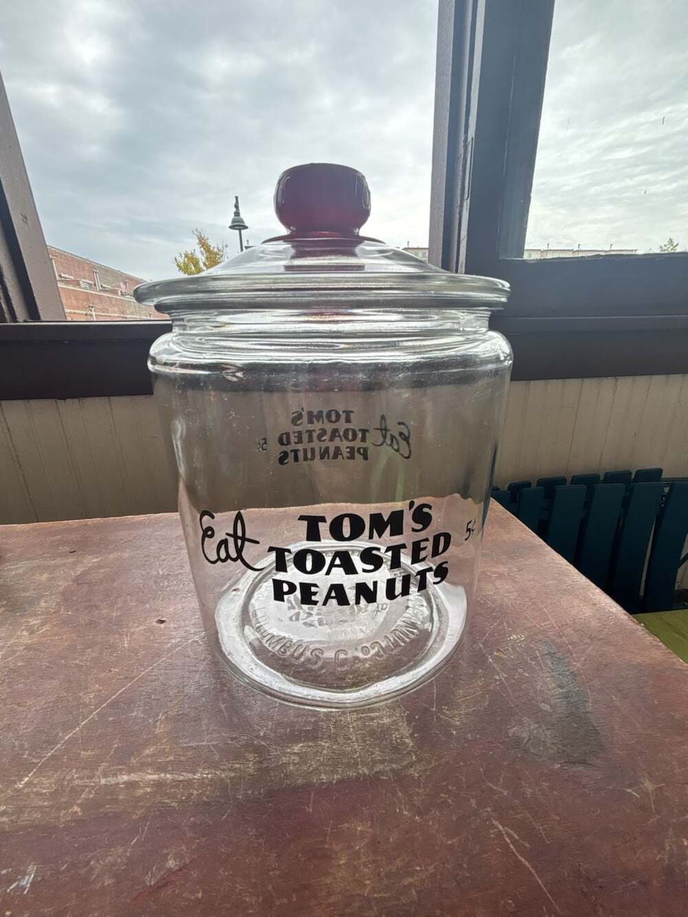 Vintage Tom's Toasted Peanuts Glass Store Display Jar with Red Lid